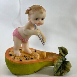 Shiah Yih Baby Figurine Playing Flute On Fruit Sculpture